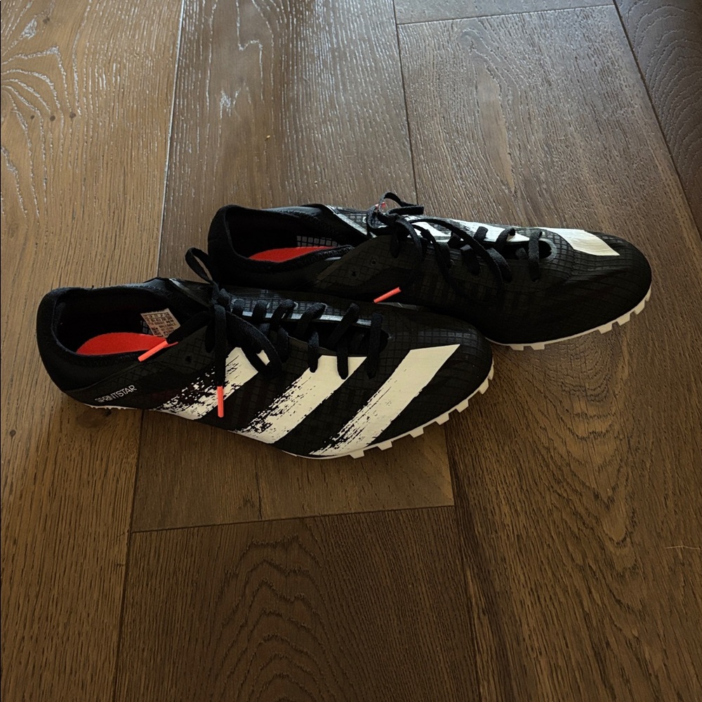 adidas Black and White Men's Soccer Shoes with Red Accents